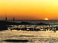 Fishing off the rocks next to Hangklip Lighthouse