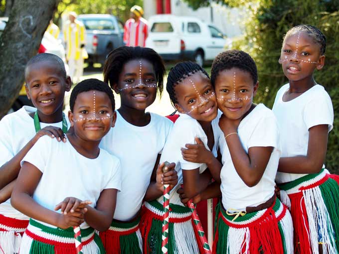 Traditional youth dancers posing before their performance